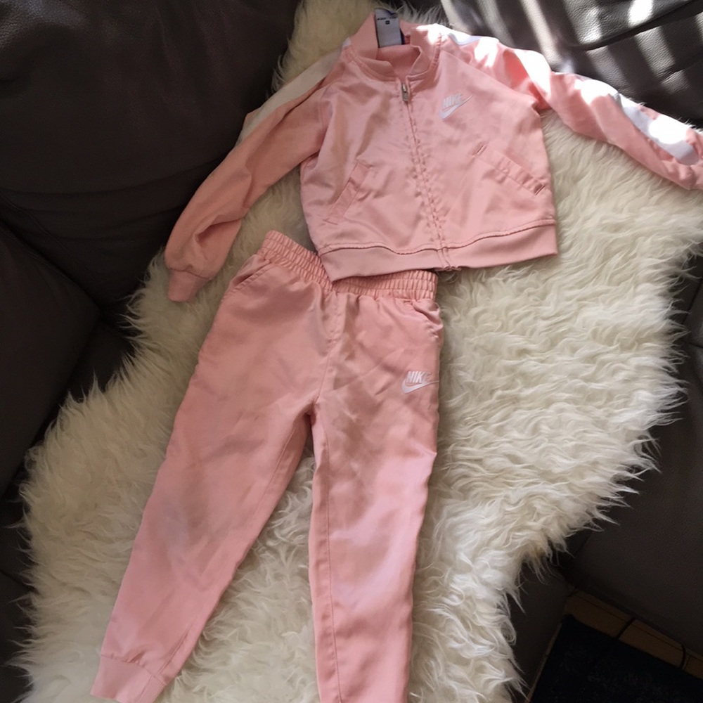 Blush colored satin Nike tracksuit